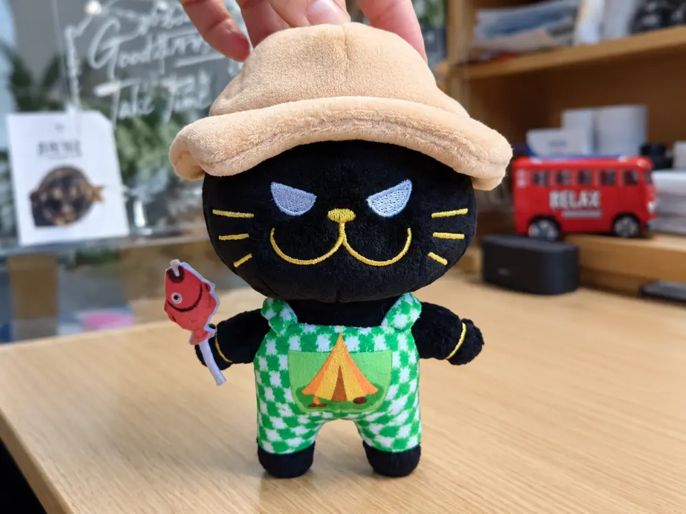 Artwork and mini plush keychain detail adaptation
